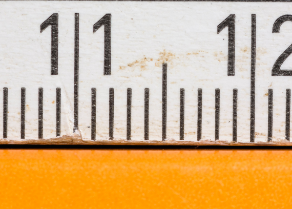 Measuring tape with orange background