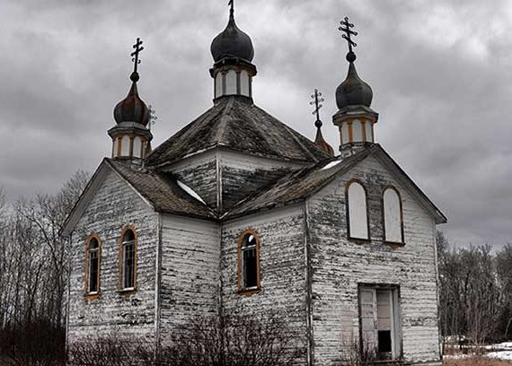 Old dilapidate church in small prairie locations